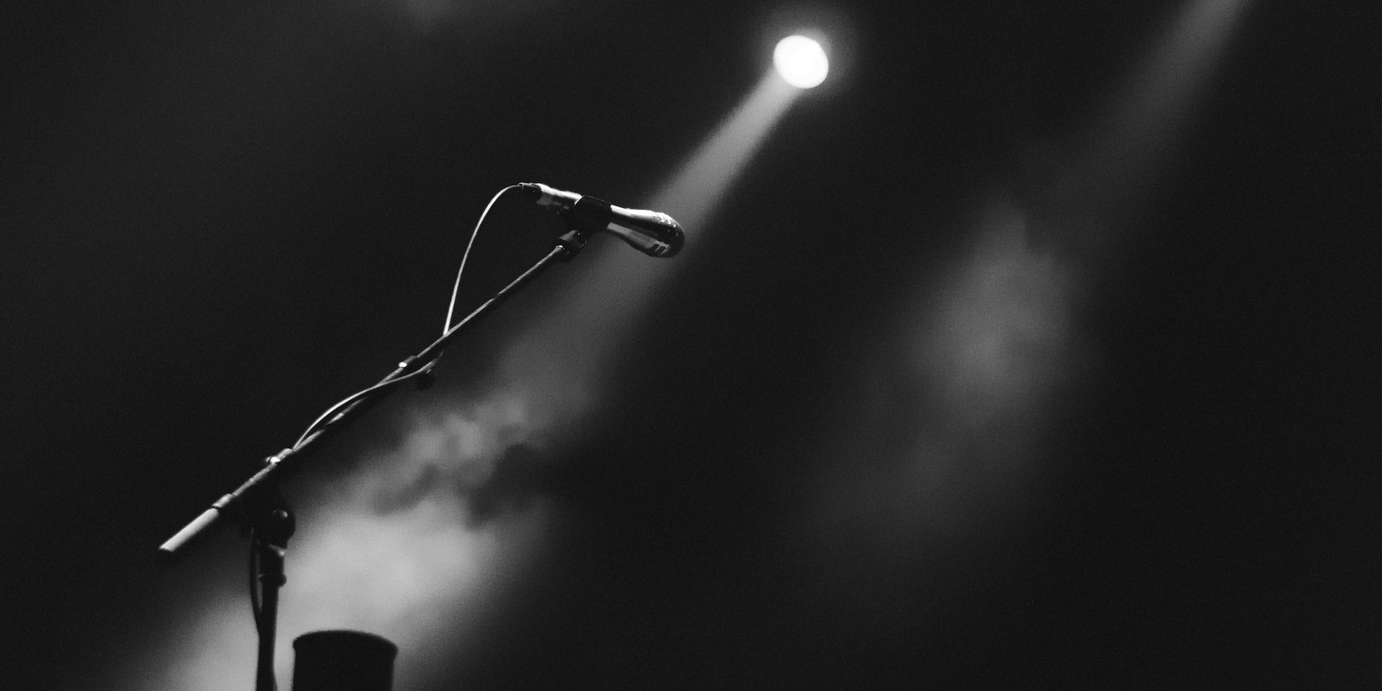 concert stage with microphone on stand